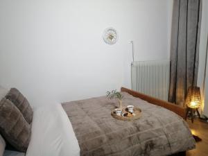 Postel nebo postele na pokoji v ubytování Charoula Pavliani Fthiotidas