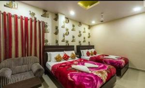 Voodi või voodid majutusasutuse Hotel Royal palace toas