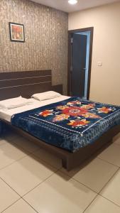 Voodi või voodid majutusasutuse Hotel Royal palace toas