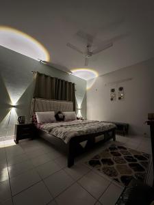 Photo de la galerie de l'établissement Rosewood Cottage, à Karachi