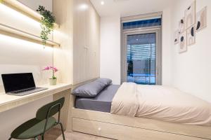 Next'Living - Luxury Private Room in a CoLiving Villa的电视和/或娱乐中心