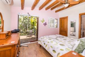 Posteľ alebo postele v izbe v ubytovaní Casa Marula