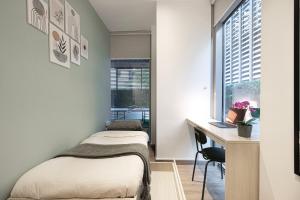 Next'Living - Luxury Private Room in a CoLiving Villa客房内的一张或多张床位
