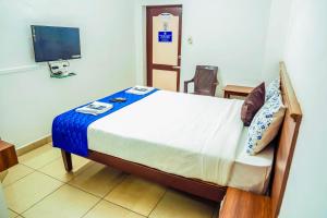 Postel nebo postele na pokoji v ubytování VKG Hotels