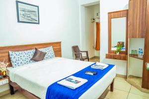 Postel nebo postele na pokoji v ubytování VKG Hotels