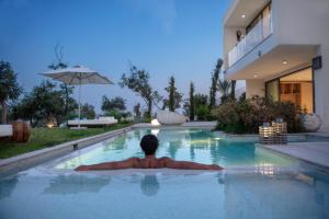 A piscina localizada em Susona Bodrum, LXR Hotels & Resorts ou nos arredores