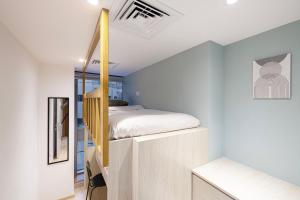 Next'Living - Luxury Private Room in a CoLiving Villa客房内的一张或多张床位