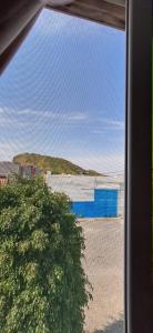 a view of a beach from a window at Casa Tota in Assomada