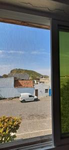 a view of a white car parked in a parking lot at Casa Tota in Assomada
