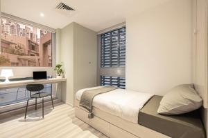 Next'Living - Luxury Private Room in a CoLiving Villa客房内的一张或多张床位