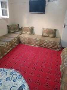 Giường trong phòng chung tại Appartement au centre ville
