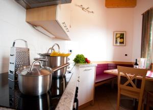 A kitchen or kitchenette at Gasserhof Aicha