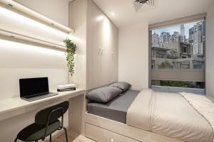 Next'Living - Luxury Private Room in a CoLiving Villa的电视和/或娱乐中心