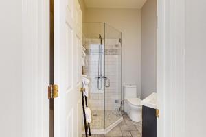 a bathroom with a shower and a toilet at Blissful Wakes in South Burlington +29 photos