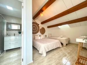 Postel nebo postele na pokoji v ubytování Casa Marítima Mediterránea