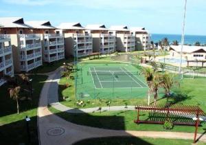 an aerial view of a tennis court in a resort at Apartamento com cobertura no Portamaris Resort in Aquiraz