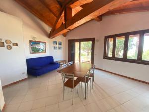 Et tv og/eller underholdning på Villetta Capo Coda Cavallo 2