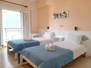 Postel nebo postele na pokoji v ubytování Pension Holidays