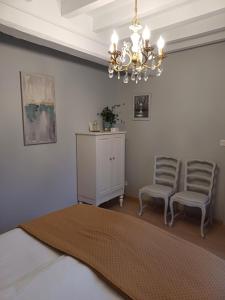 Postel nebo postele na pokoji v ubytování Le Repos Coquelicot