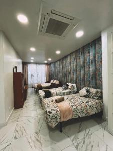 Ένα ή περισσότερα κρεβάτια σε δωμάτιο στο Estudio Estadio Wanda Metropolitano +27 φωτογραφίες