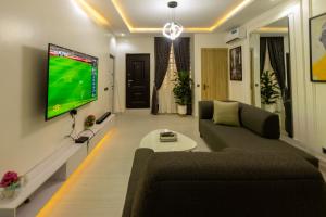 TV at/o entertainment center sa The Delphine in JWC