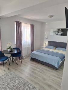 Postel nebo postele na pokoji v ubytování Sobe Sky