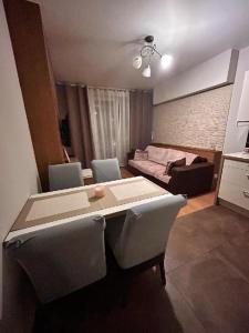 Posedenie v ubytovaní Apartament Bluszcz