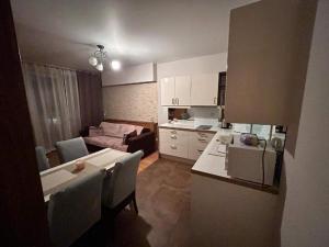 Posteľ alebo postele v izbe v ubytovaní Apartament Bluszcz