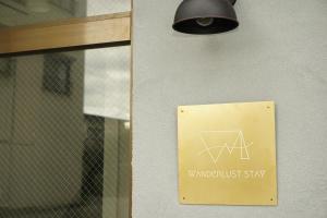 Certifikát, hodnocení, plakát nebo jiný dokument vystavený v ubytování wanderlust STAY