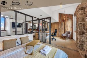 Posezení v ubytování Loft and Suites