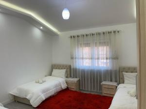 Postel nebo postele na pokoji v ubytování Jurgen House