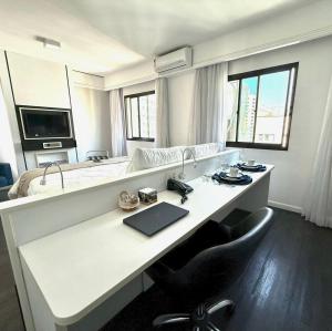 Sjónvarps- og/eða afþreyingartæki á Flat Hotel Moema Ibirapuera
