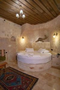 Koupelna v ubytování Kemerhan Cave Suites + 37 fotografií