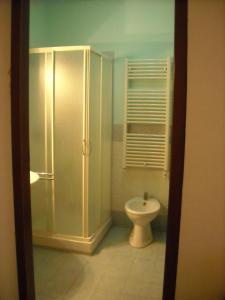 a bathroom with a shower and a toilet at B&B Sansevero Venice in Mestre