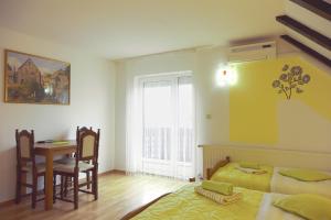 Posteľ alebo postele v izbe v ubytovaní House Pox 2
