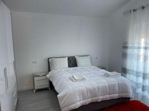 Postel nebo postele na pokoji v ubytování Jurgen House