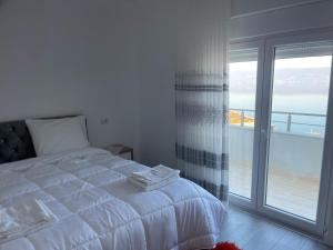 Postel nebo postele na pokoji v ubytování Jurgen House