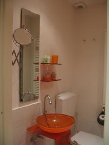 a bathroom with a sink and a toilet at Sincresis in Empoli