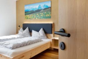 Posteľ alebo postele v izbe v ubytovaní Ratscheinerhof App Gipfelglück