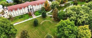 an aerial view of a building in a park at Parkhotel Green Garden in Bad Hersfeld