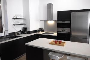 Η κουζίνα ή μικρή κουζίνα στο Le logis des Jacobins 125m2