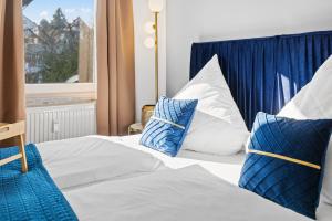 Ένα ή περισσότερα κρεβάτια σε δωμάτιο στο GOLDCREAM Suites - MODERN - NETFLIX - free parking