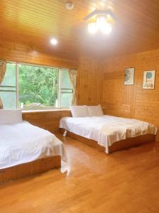 Postel nebo postele na pokoji v ubytování 南洋62之森 + 24 fotografií
