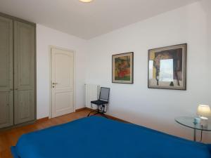 Posteľ alebo postele v izbe v ubytovaní Apartment Punta Borromea by Interhome