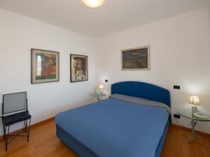 Posteľ alebo postele v izbe v ubytovaní Apartment Punta Borromea by Interhome