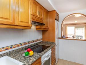 A kitchen or kitchenette at Apartment Vila De Oropesa IV by Interhome