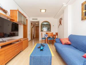 A television and/or entertainment centre at Apartment Vila De Oropesa IV by Interhome Még 14 kép