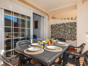 A seating area at Apartment Vila De Oropesa IV by Interhome