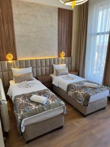 Letto o letti in una camera di Apostolovic Plus