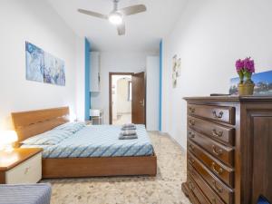 A bed or beds in a room at Studio Fra Cristoforo Studio Apartment by Interhome